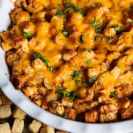 cheesy herb stuffing in a baking dish