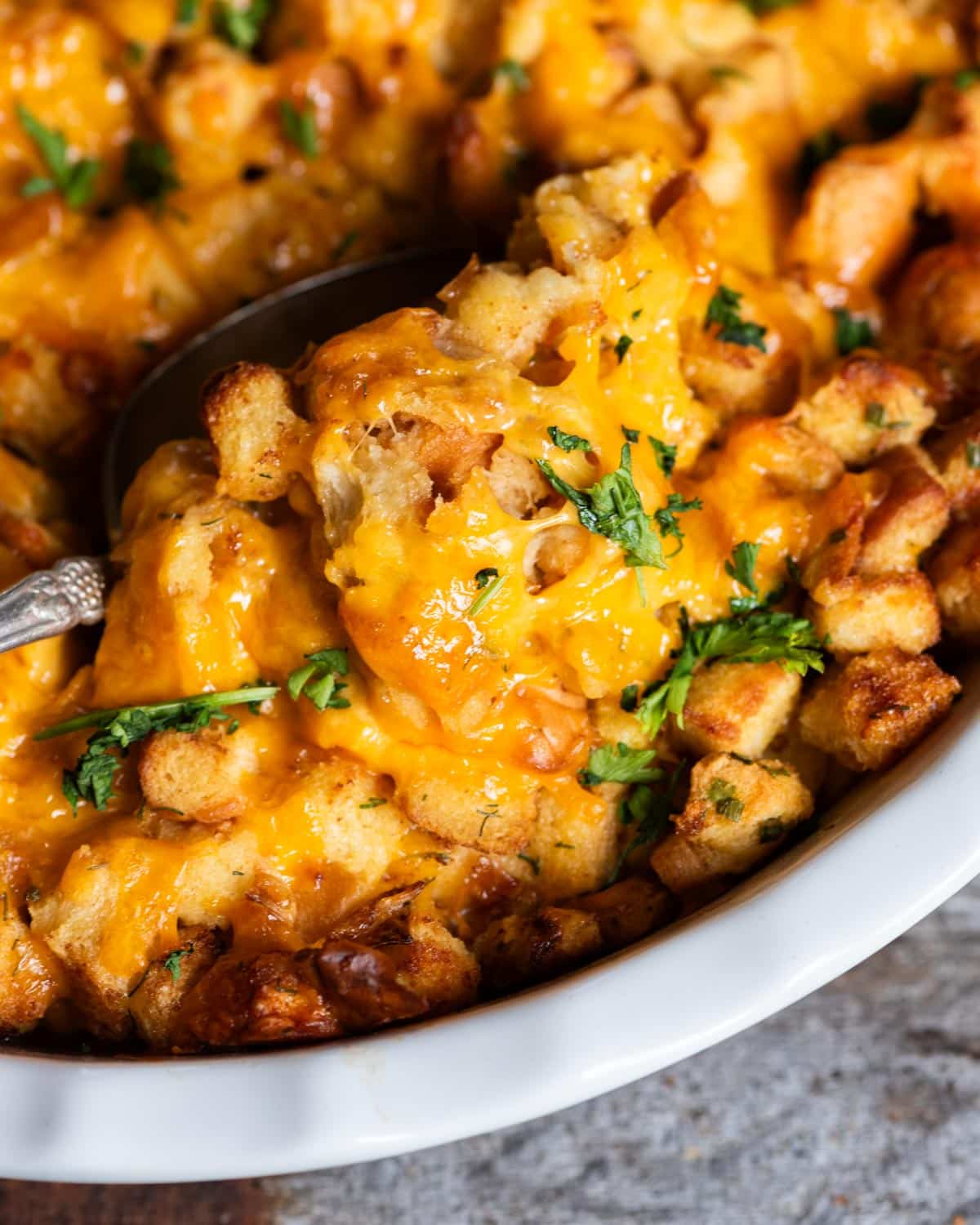 herb stuffing with cheese in a baking dish