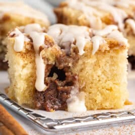 a piece of cinnamon roll coffee cake on a table