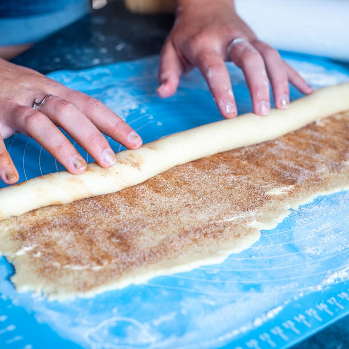 rolling pie dough like cinnamon rolls