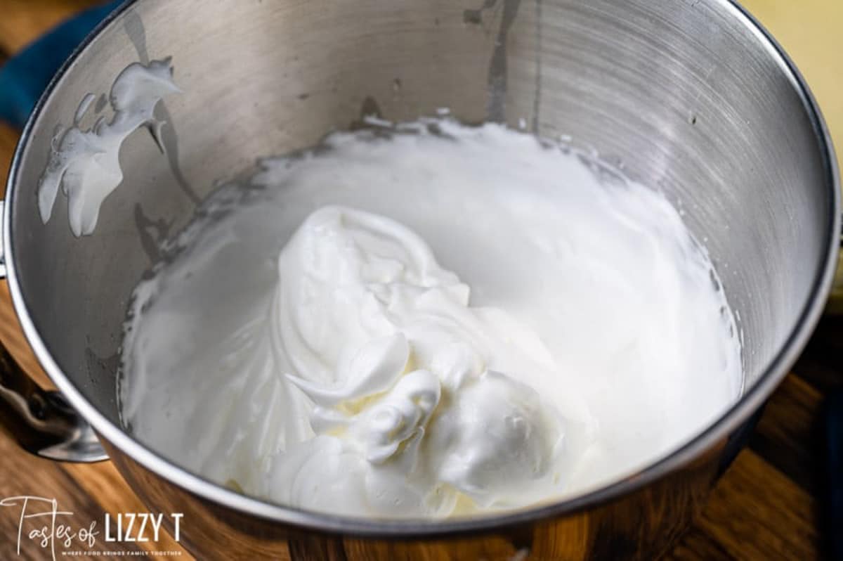 frothed egg whites in a mixing bowl