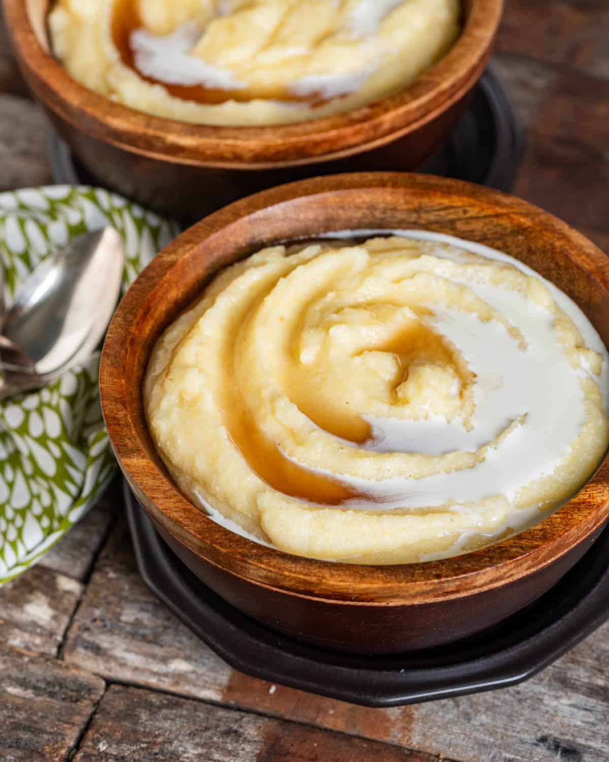 two bowls of cornmeal mush on a table