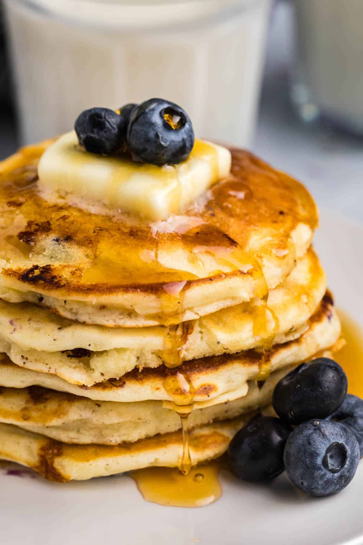 a stack of blueberry cottage cheese pancakes