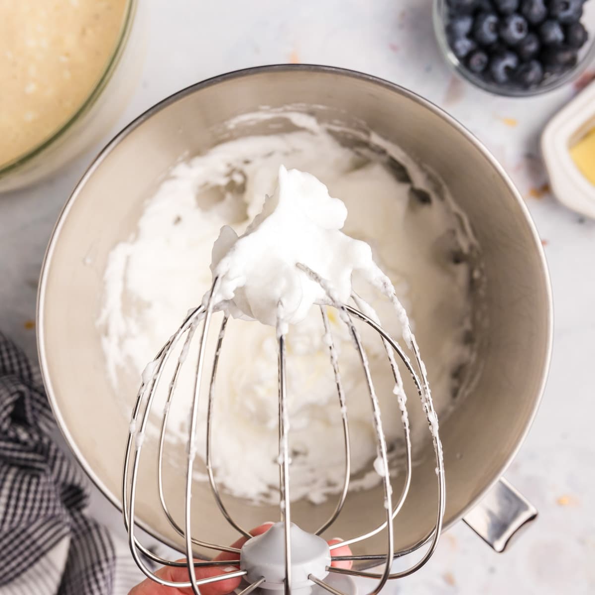 whipped egg whites on a wire whisk