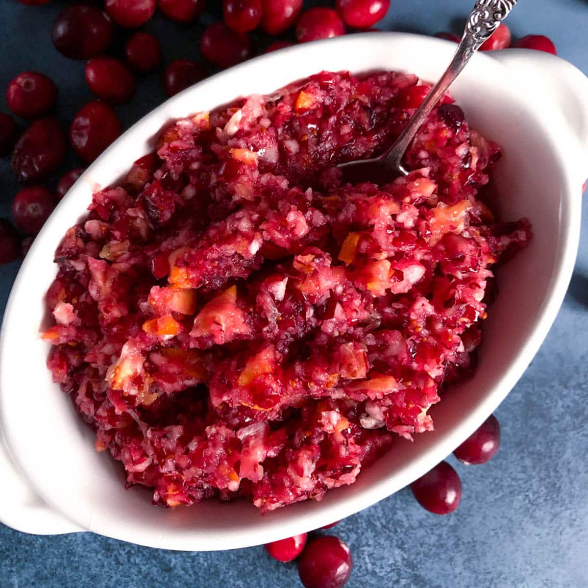 cranberry relish in a bowl with a spoon