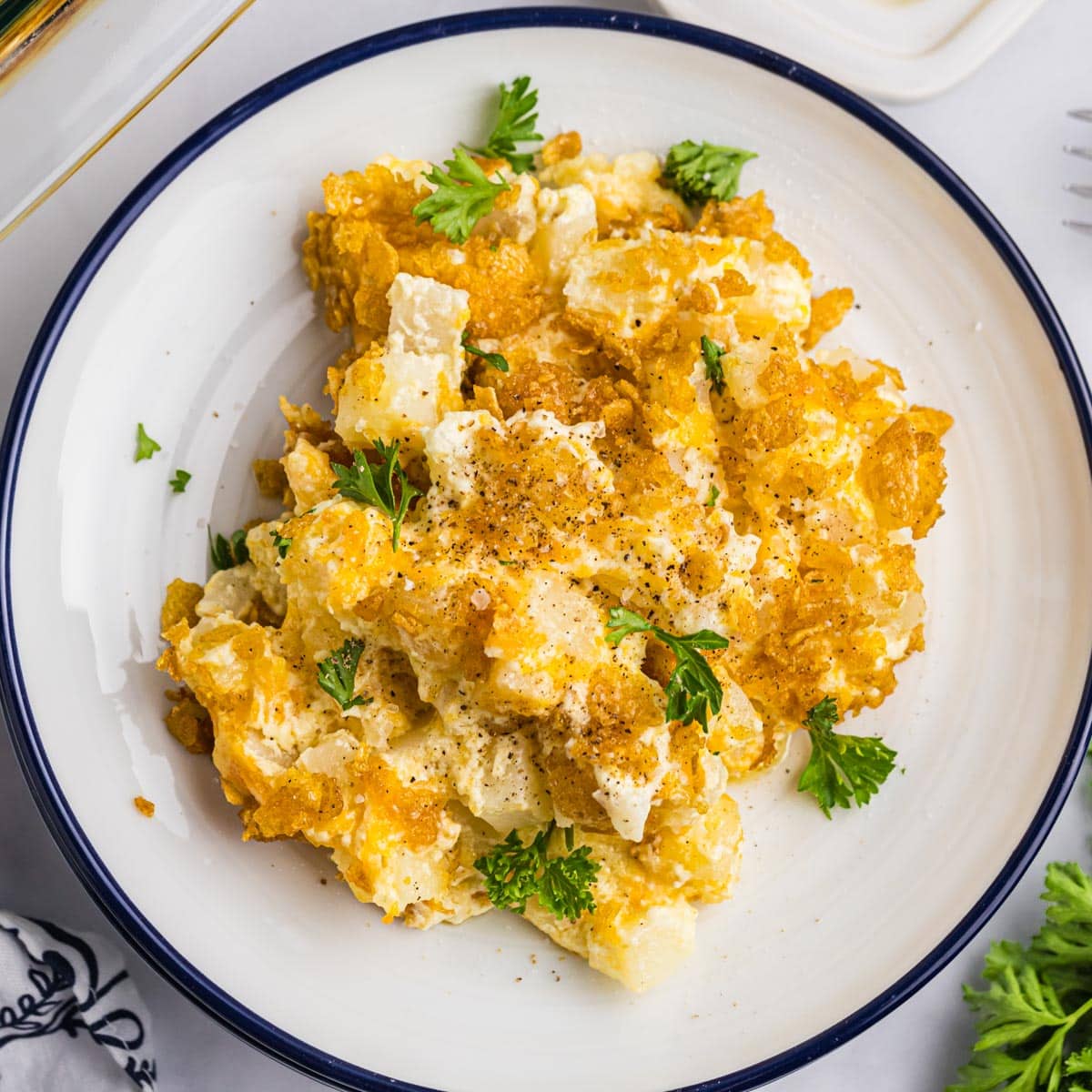 seasoned funeral potatoes on a plate