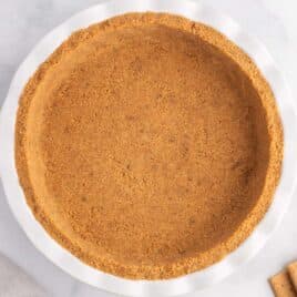 overhead view of a deep dish graham cracker pie crust