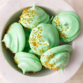 green meringue drops in a white dish