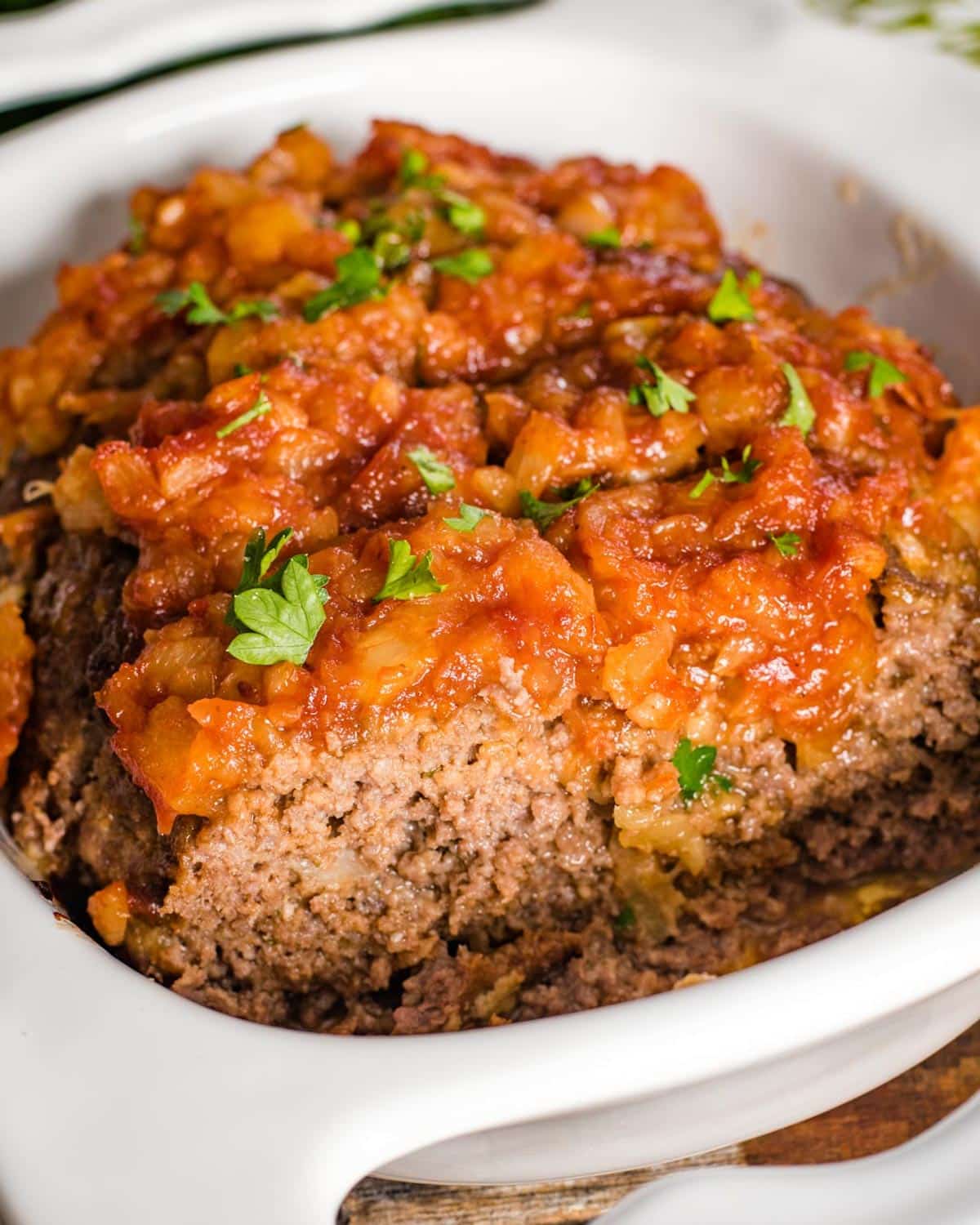 meatloaf with pineapple glaze in a baking dish