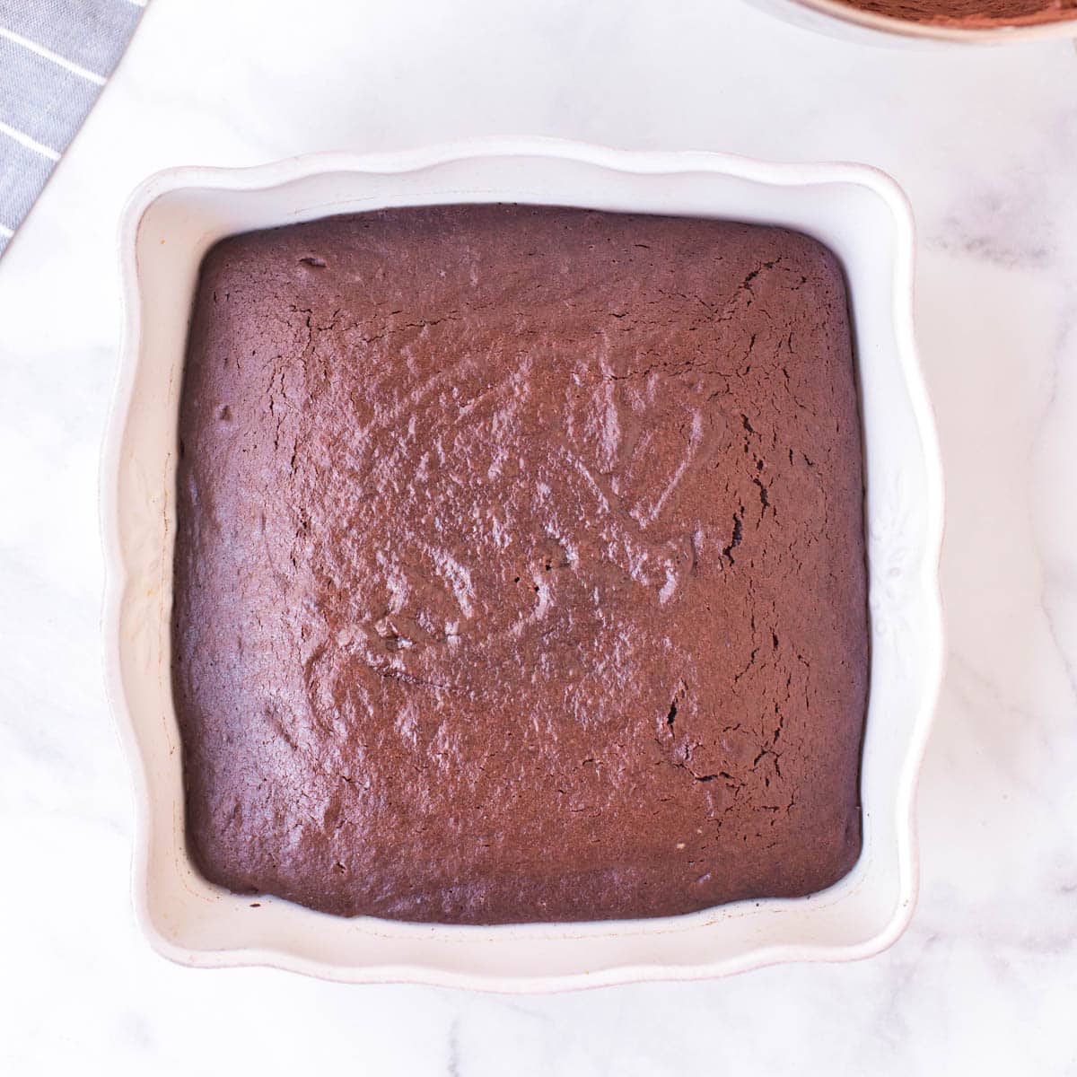 overhead view of a baked chocolate cake