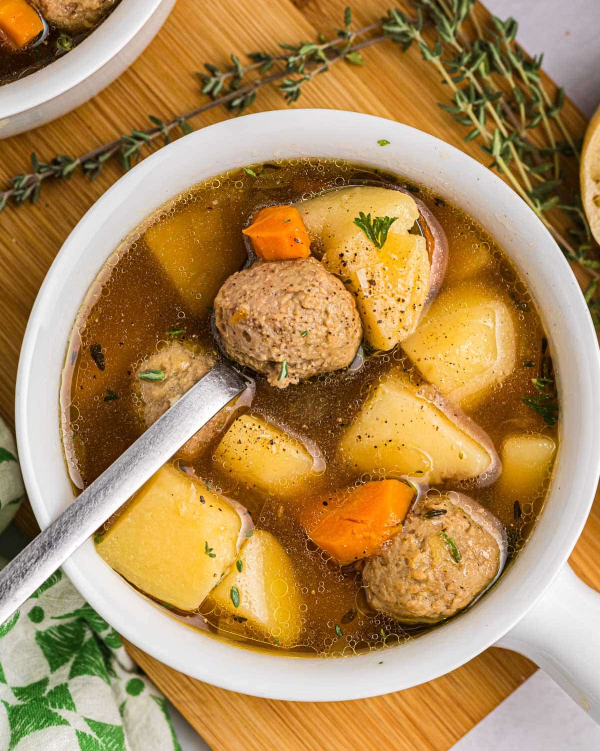 overhead view of meatball potato soup in a bowl