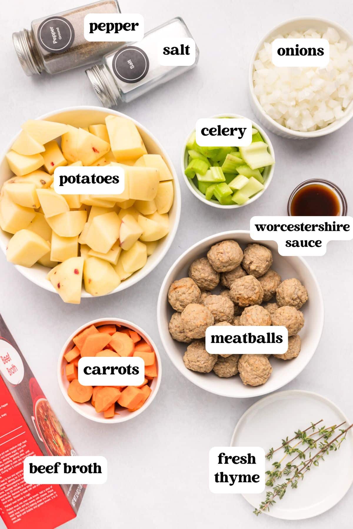 ingredients for meatball potato soup on a table