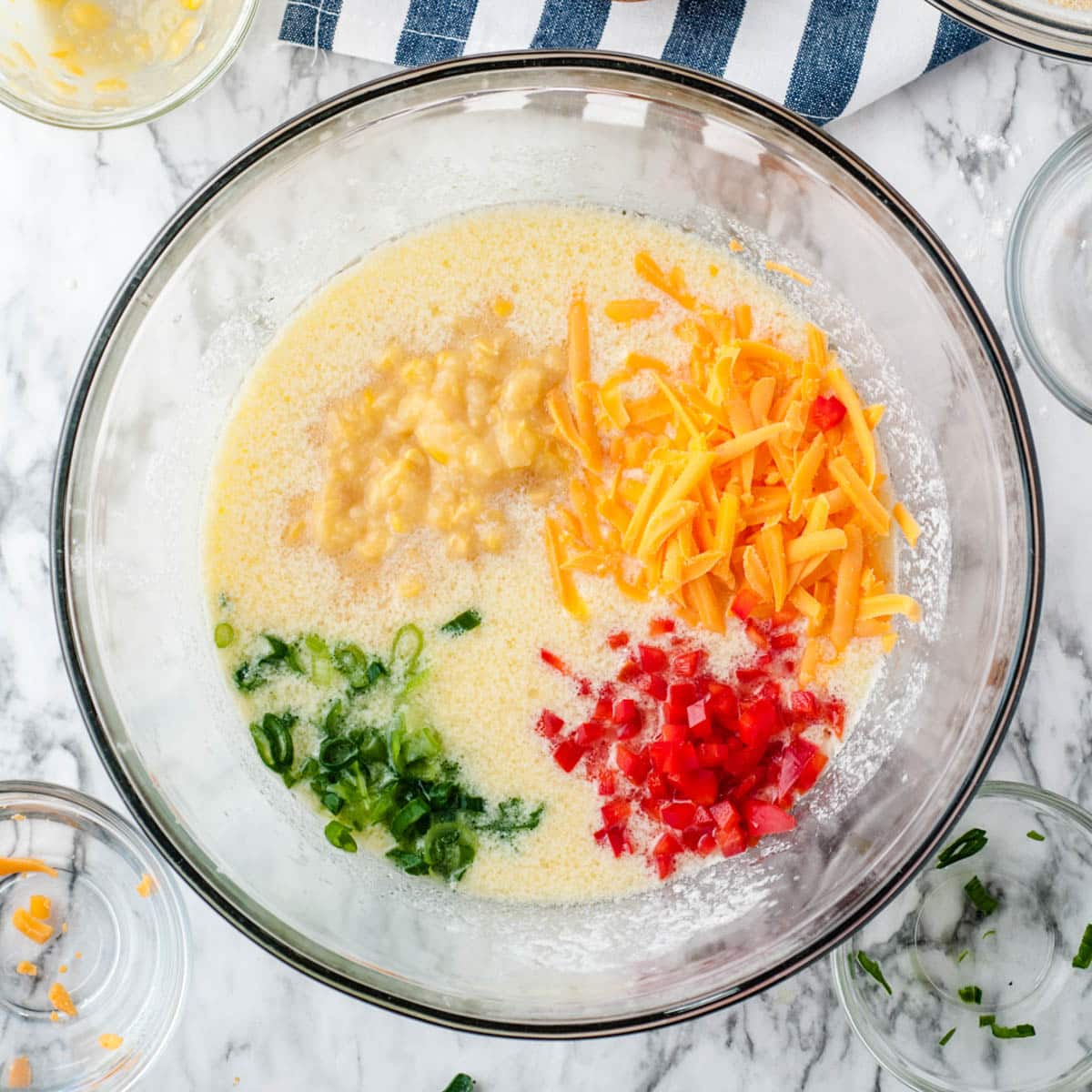 ingredients for cornbread unmixed in a bowl