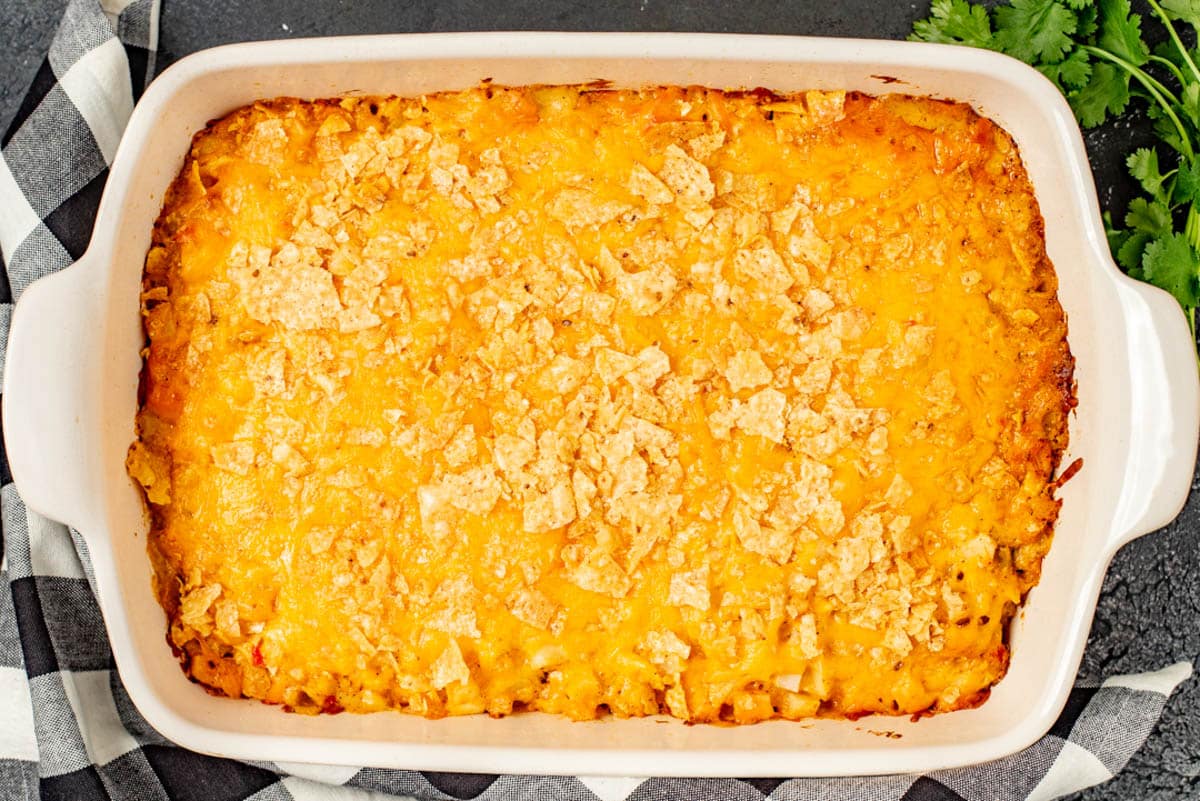 baked chicken casserole with nacho cheese and tortilla chips