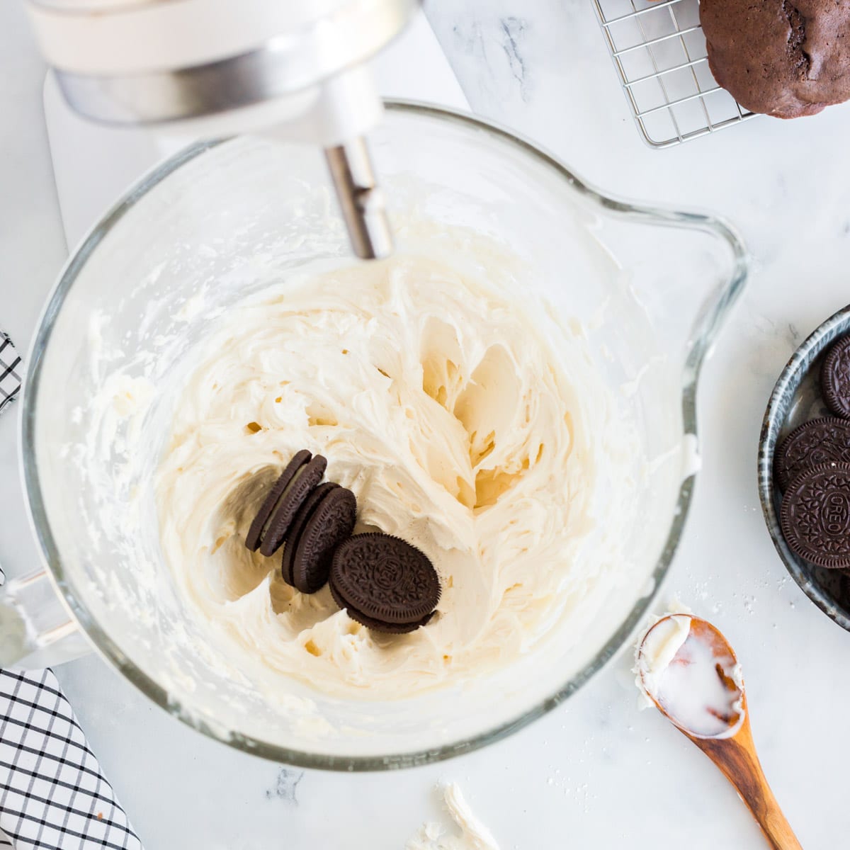 oreos on frosting in a bowl