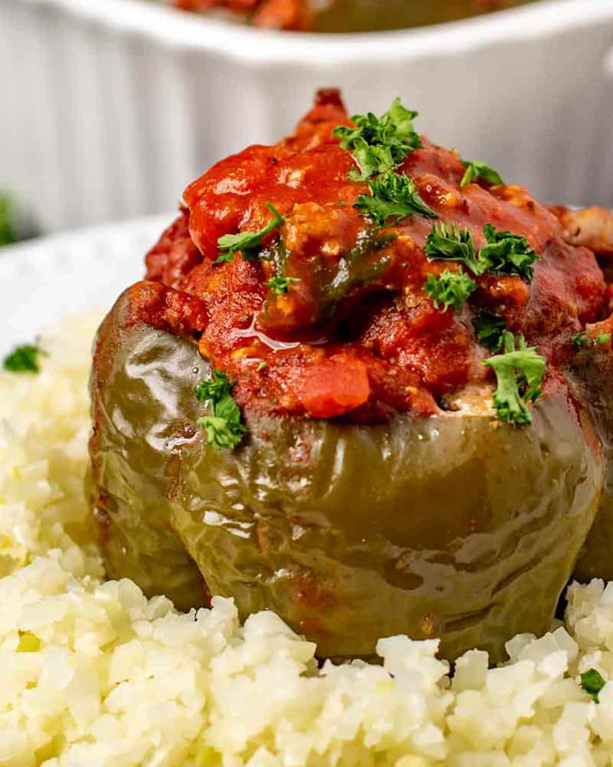 paleo stuffed pepper on a bed of cauliflower rice