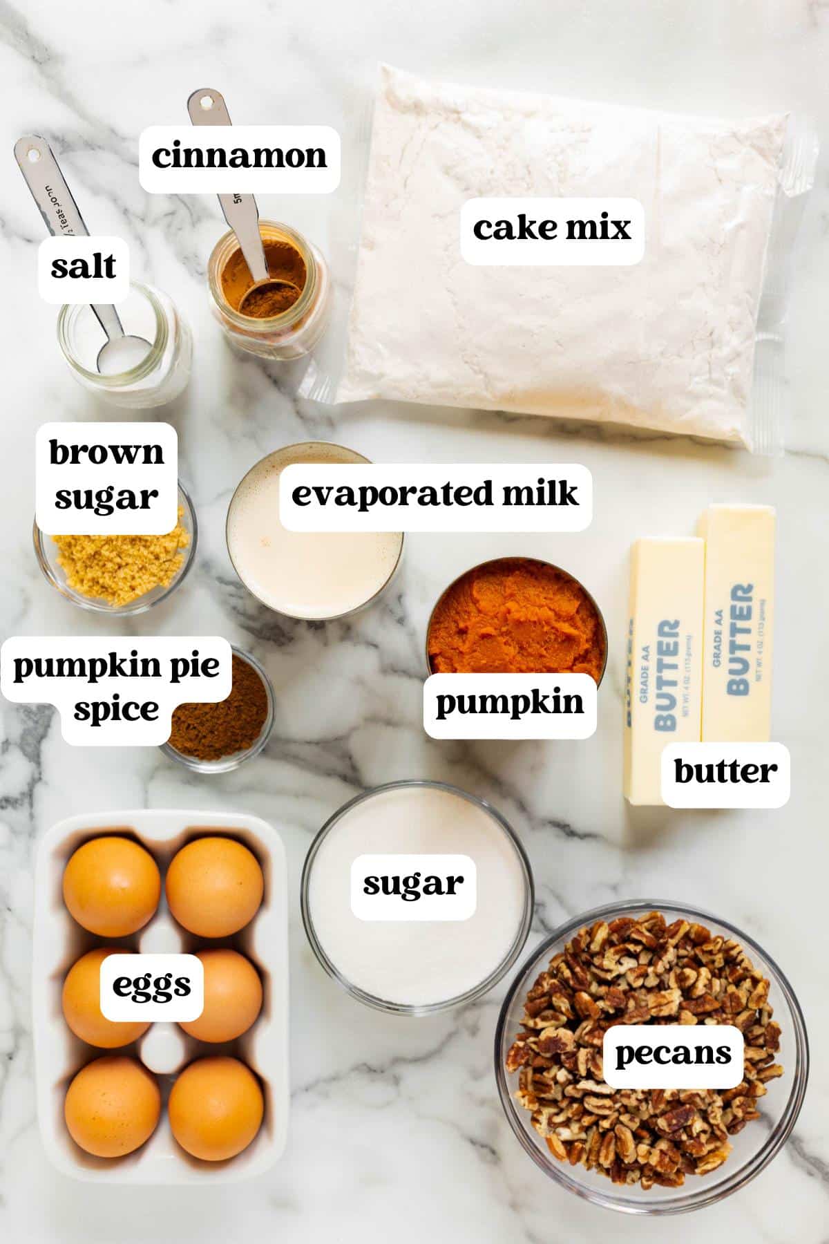 ingredients for pumpkin dump cake on a table