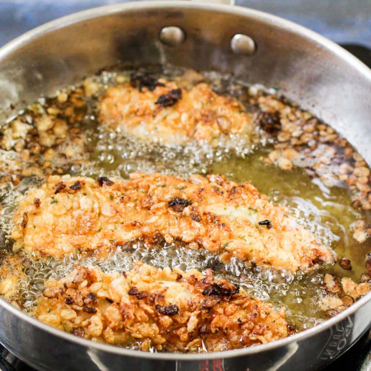 rice krispie chicken frying in oil