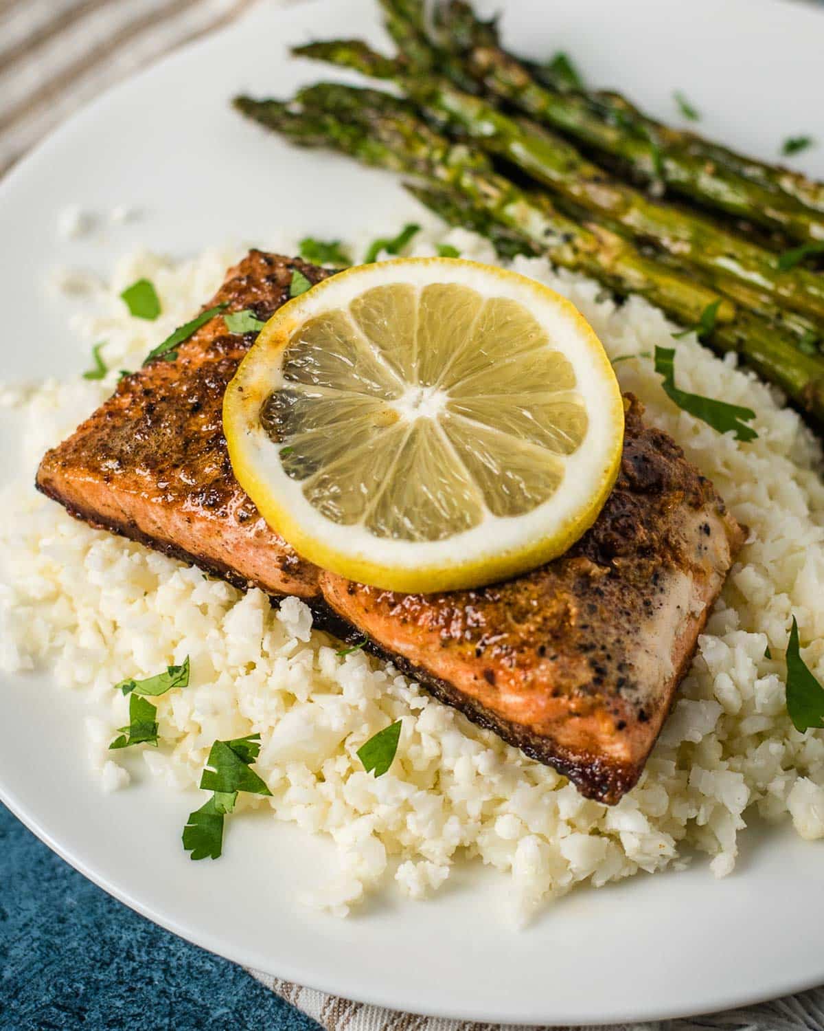 salmon with cauliflower rice on a plate