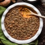 sweet potato casserole in a round white baking dish