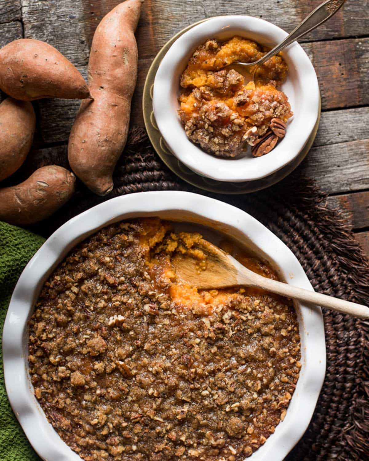 sweet potato casserole with pecan topping on a table