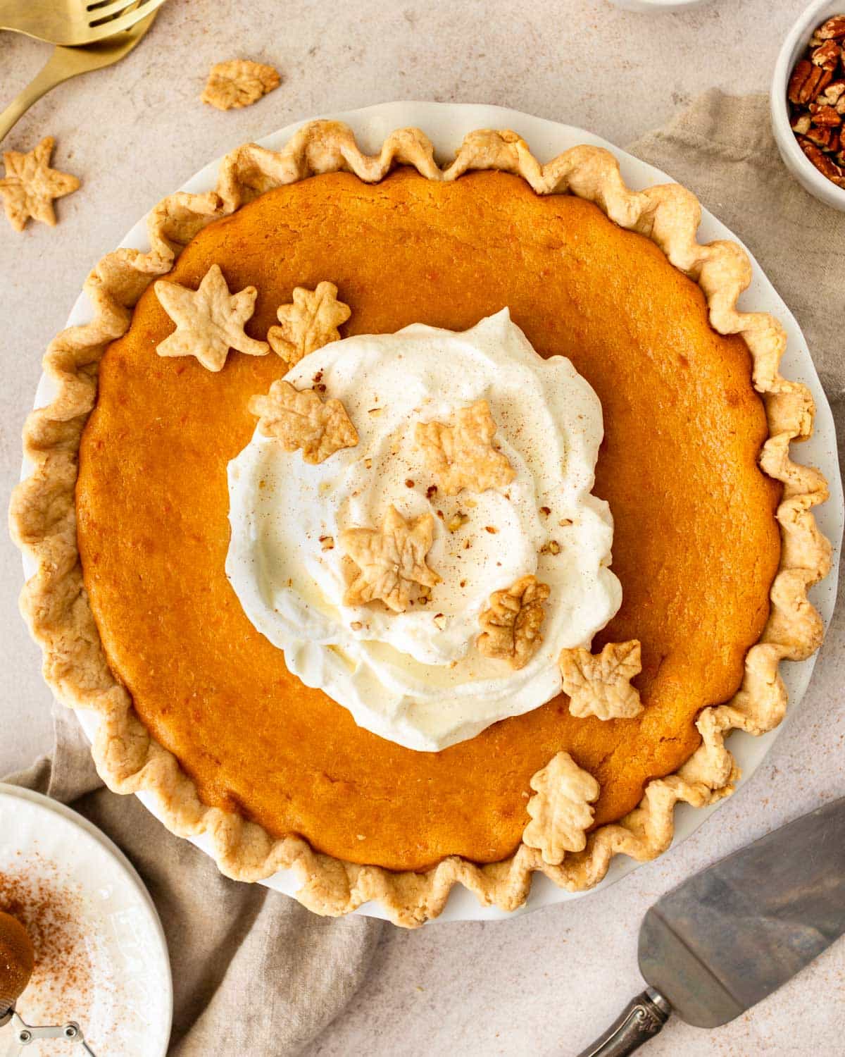 overhead view of a sweet potato pie with vanilla pudding and whipped cream