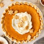 overhead view of a sweet potato pie with vanilla pudding and whipped cream