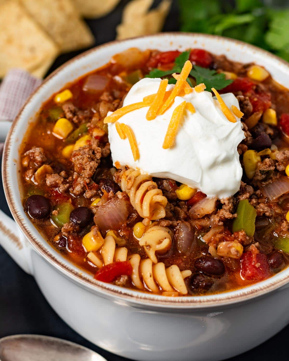 a bowl of taco soup with sour cream on top