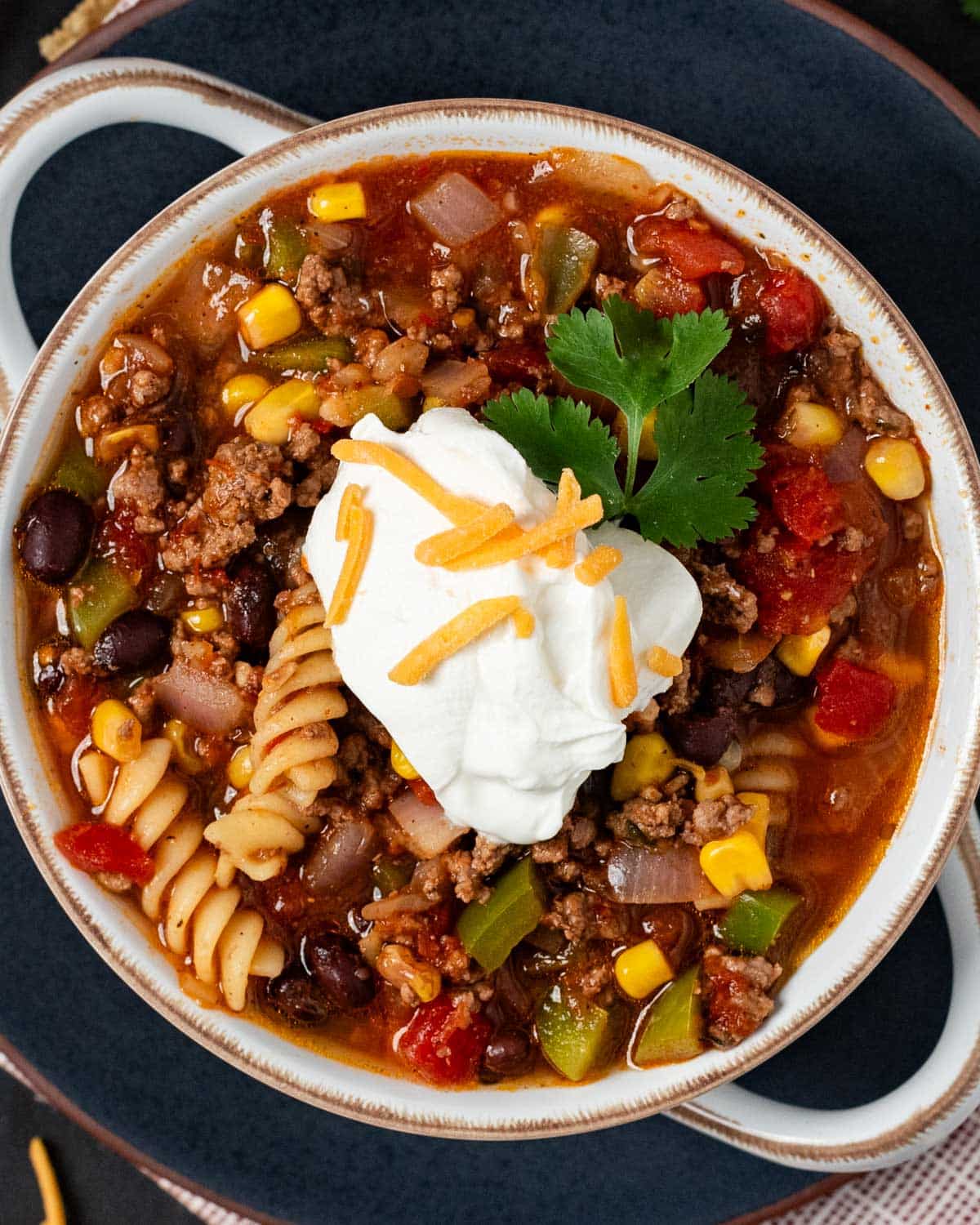 overhead view of taco soup with noodles