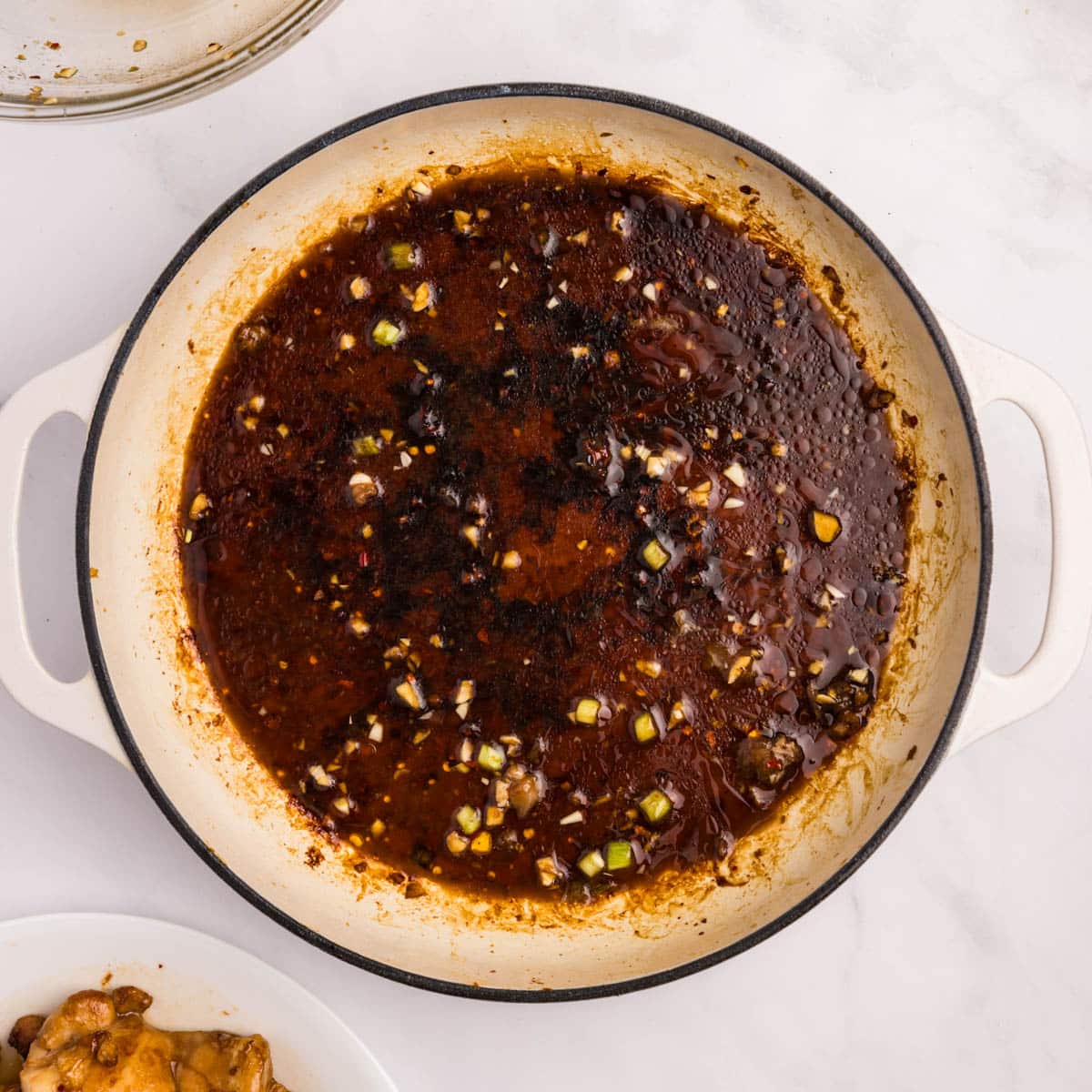 teriyaki sauce simmering in a skillet