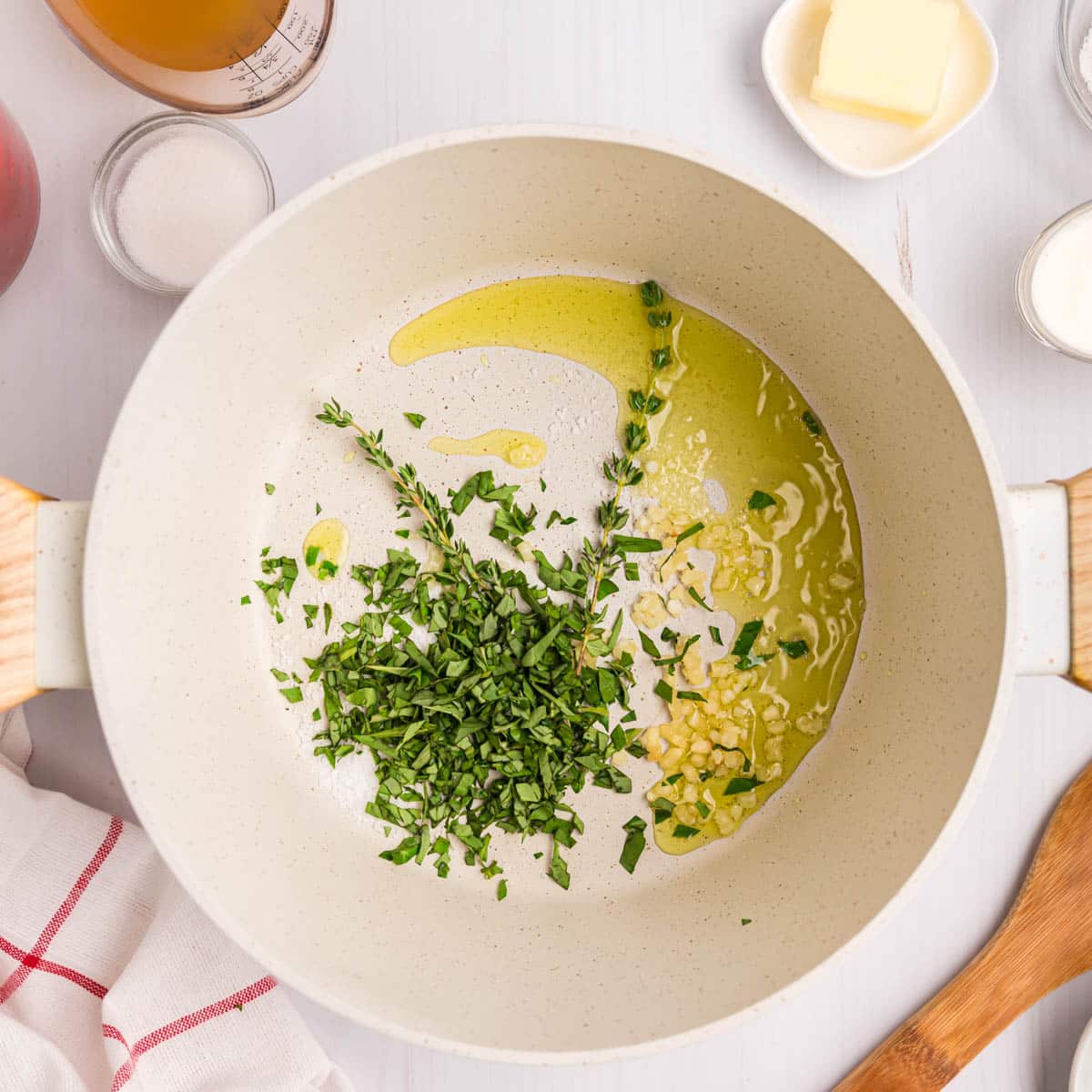 fresh thyme, garlic and oil in a saucepan