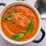 closeup of tomato bisque soup in a bowl