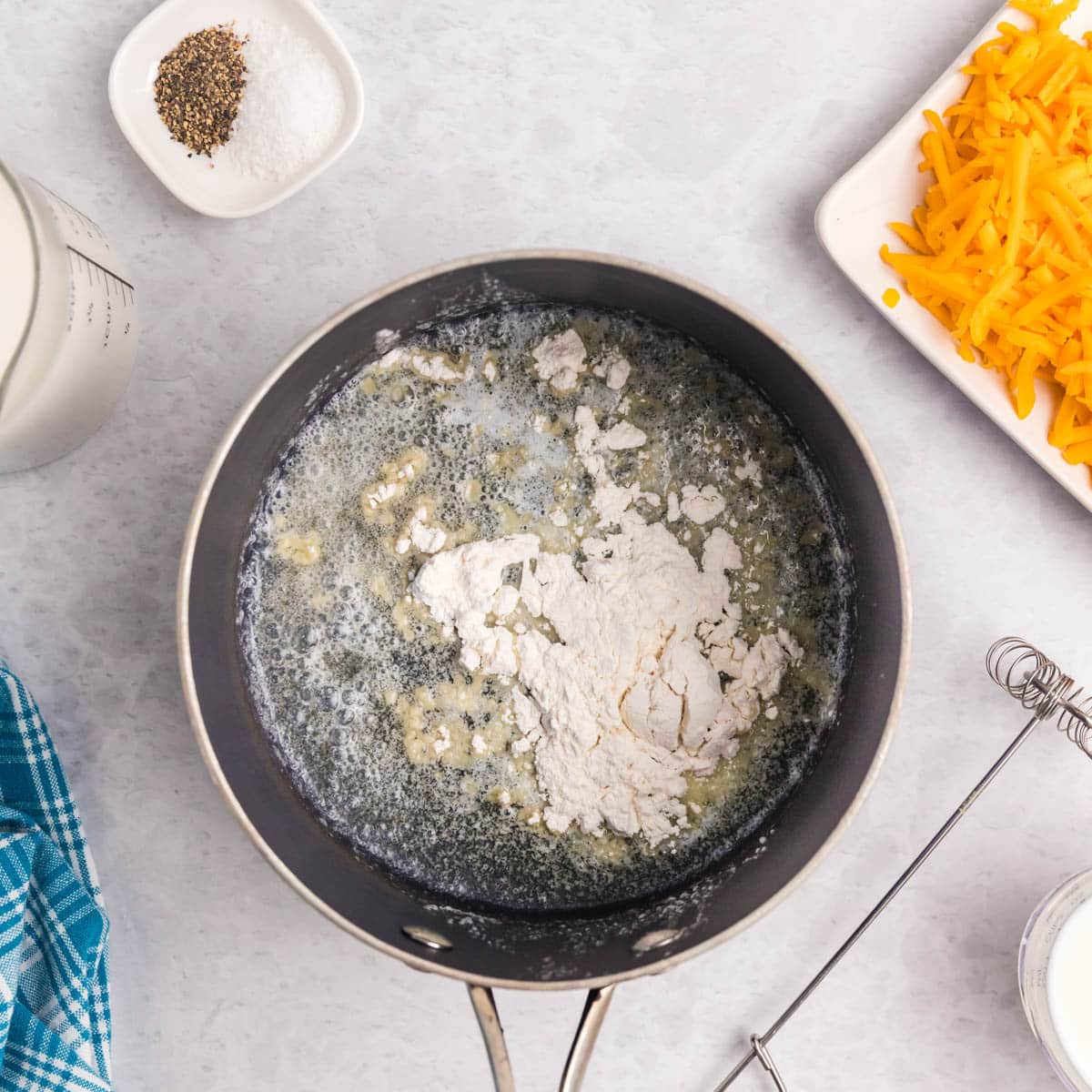 flour in a skillet with melted butter