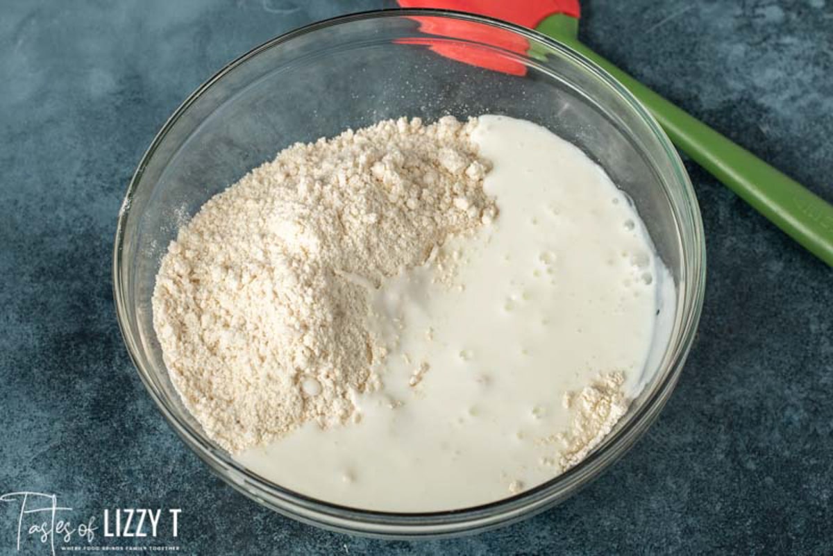 flour and milk in a glass bowl