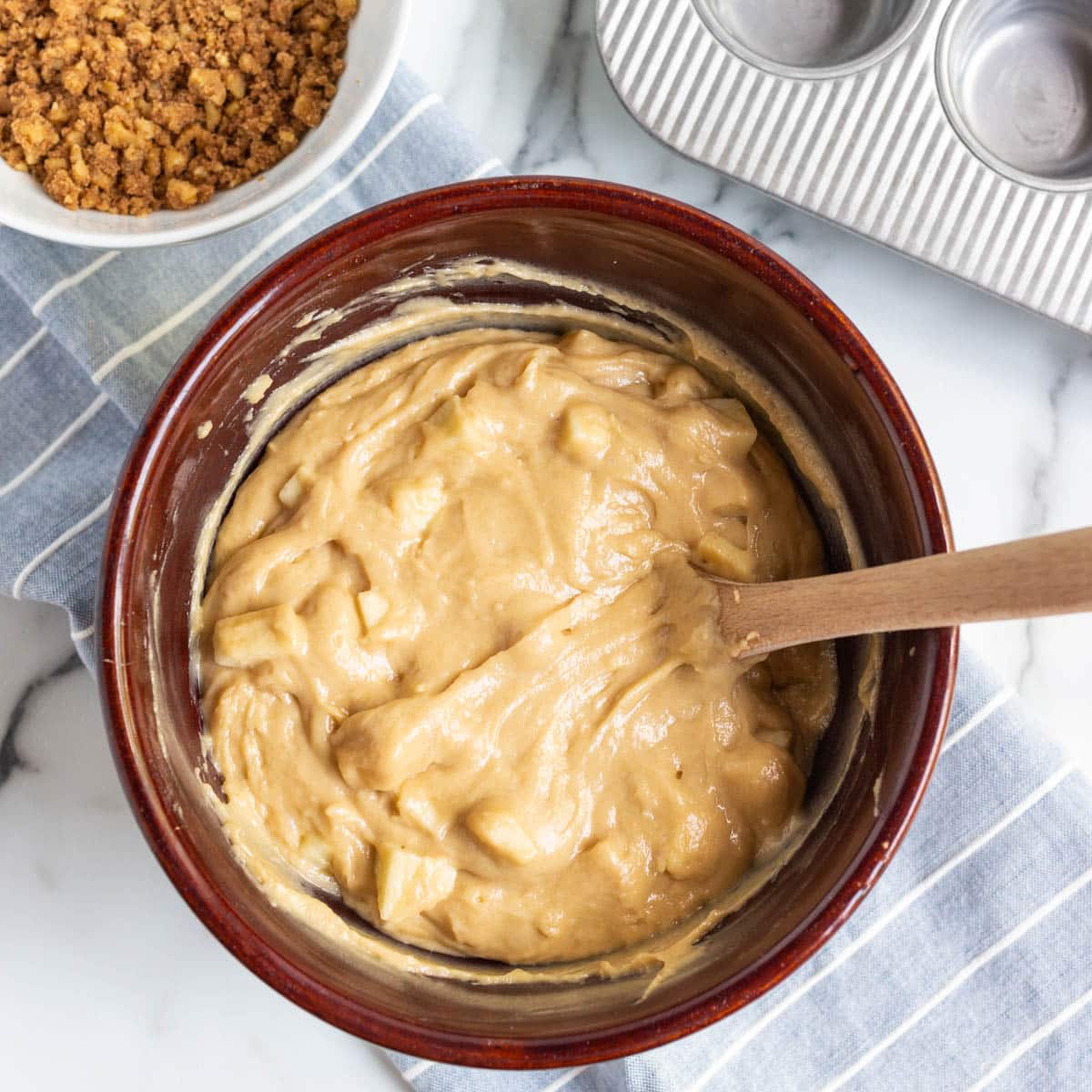 caramel apple muffin batter in a bowl