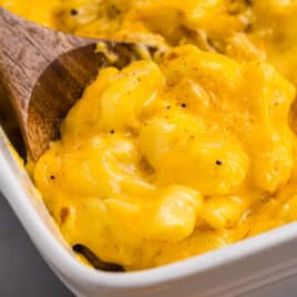 closeup of cheesy potatoes in a casserole