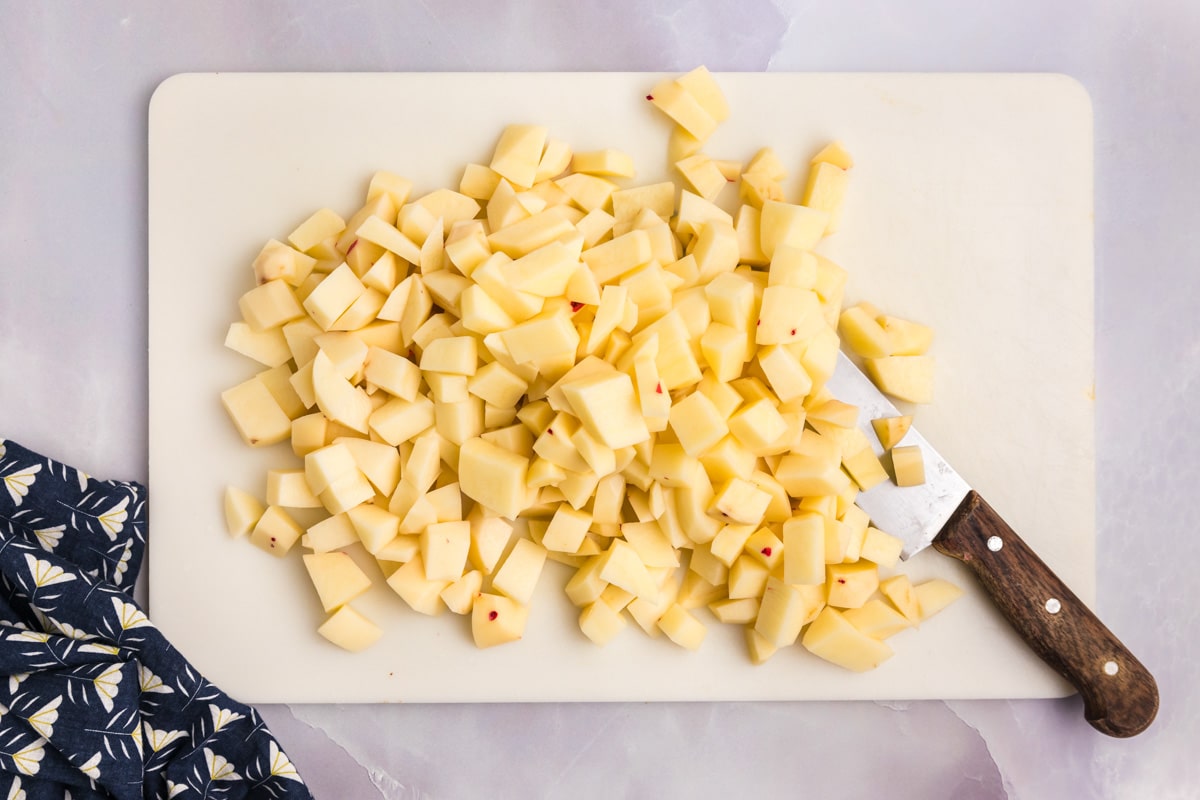 cut potatoes on a cutting board