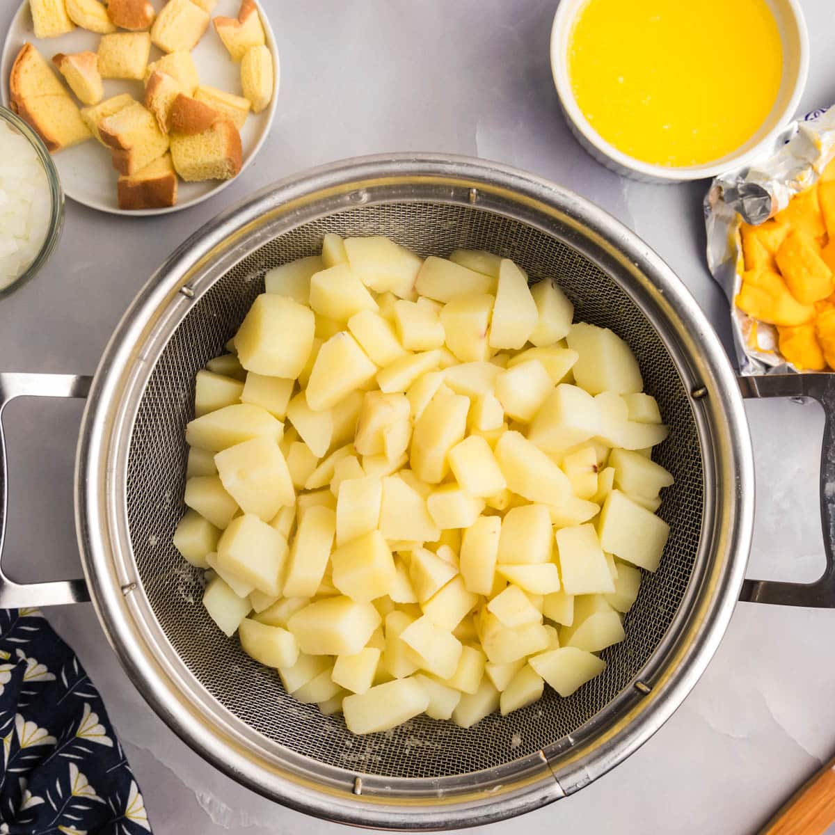 cooked potatoes on a colander