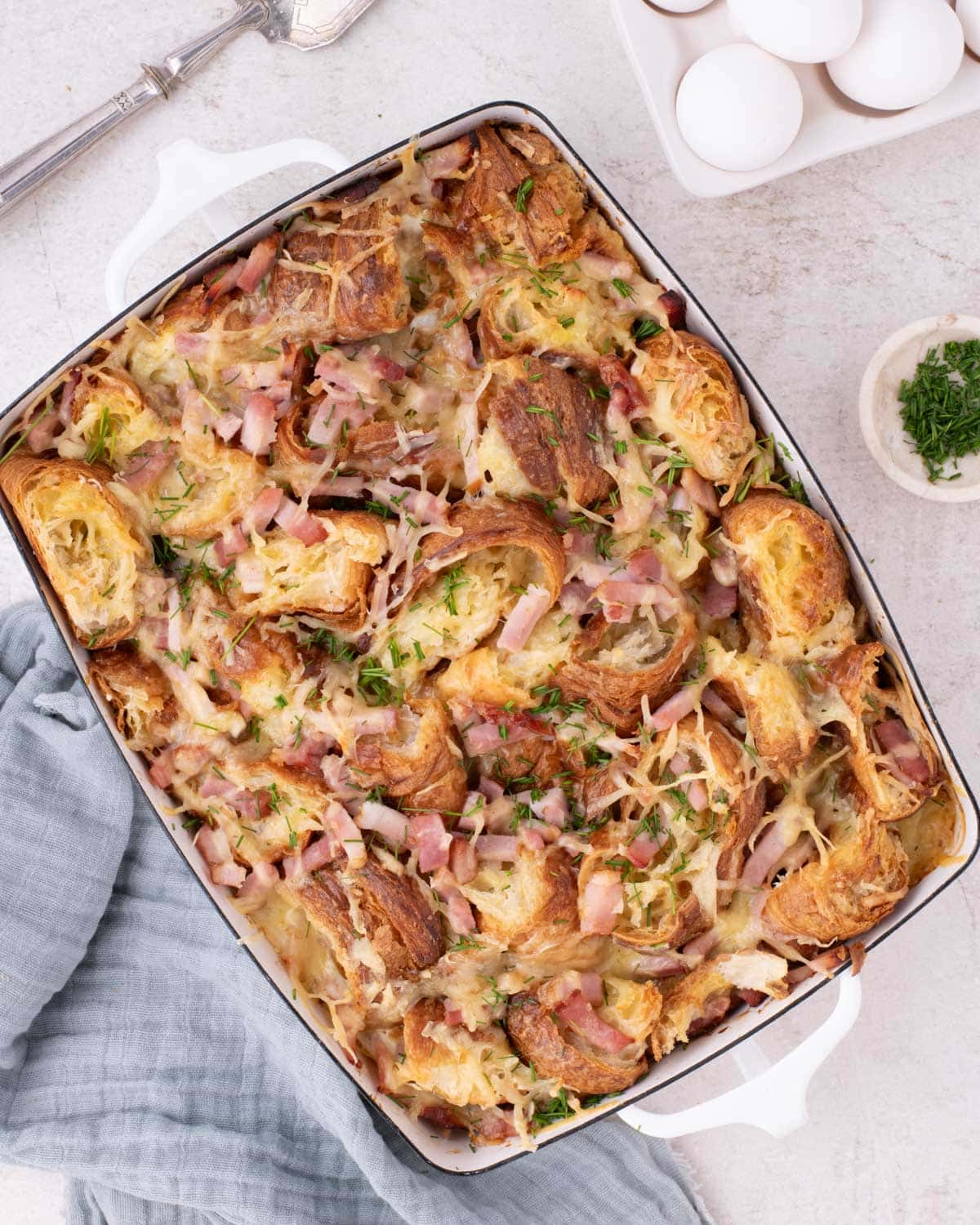 overhead view of a croissant breakfast bake on a table