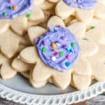 closeup of a flower cut out sugar cookie with frosting