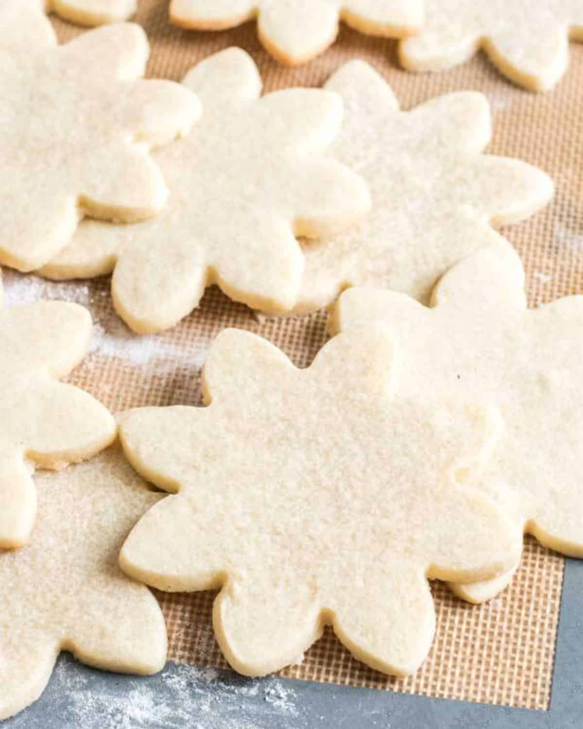 flower cut out cookies on a table