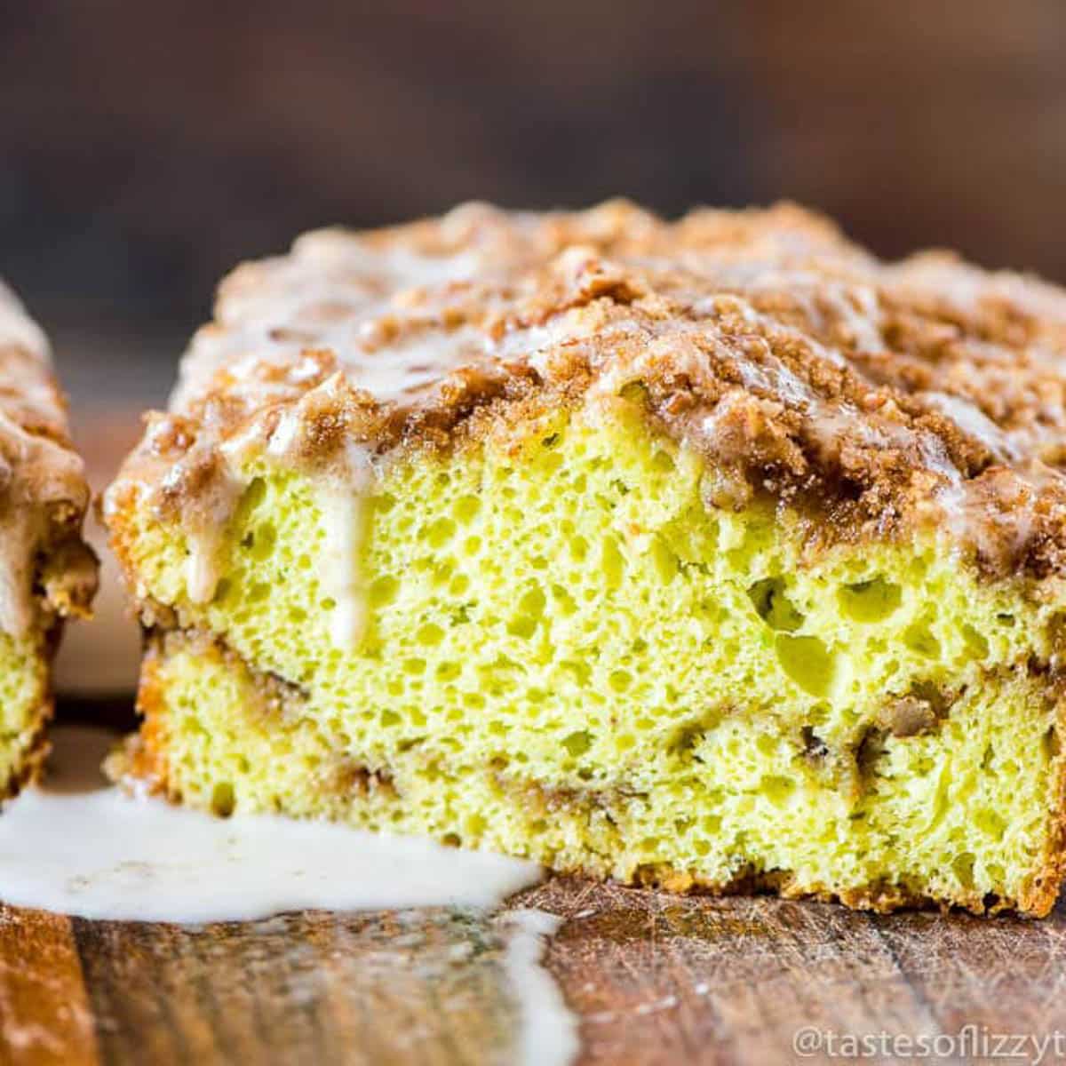 glaze icing dripping off of pistachio bread