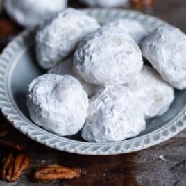 a bowl of mexican snowball cookies