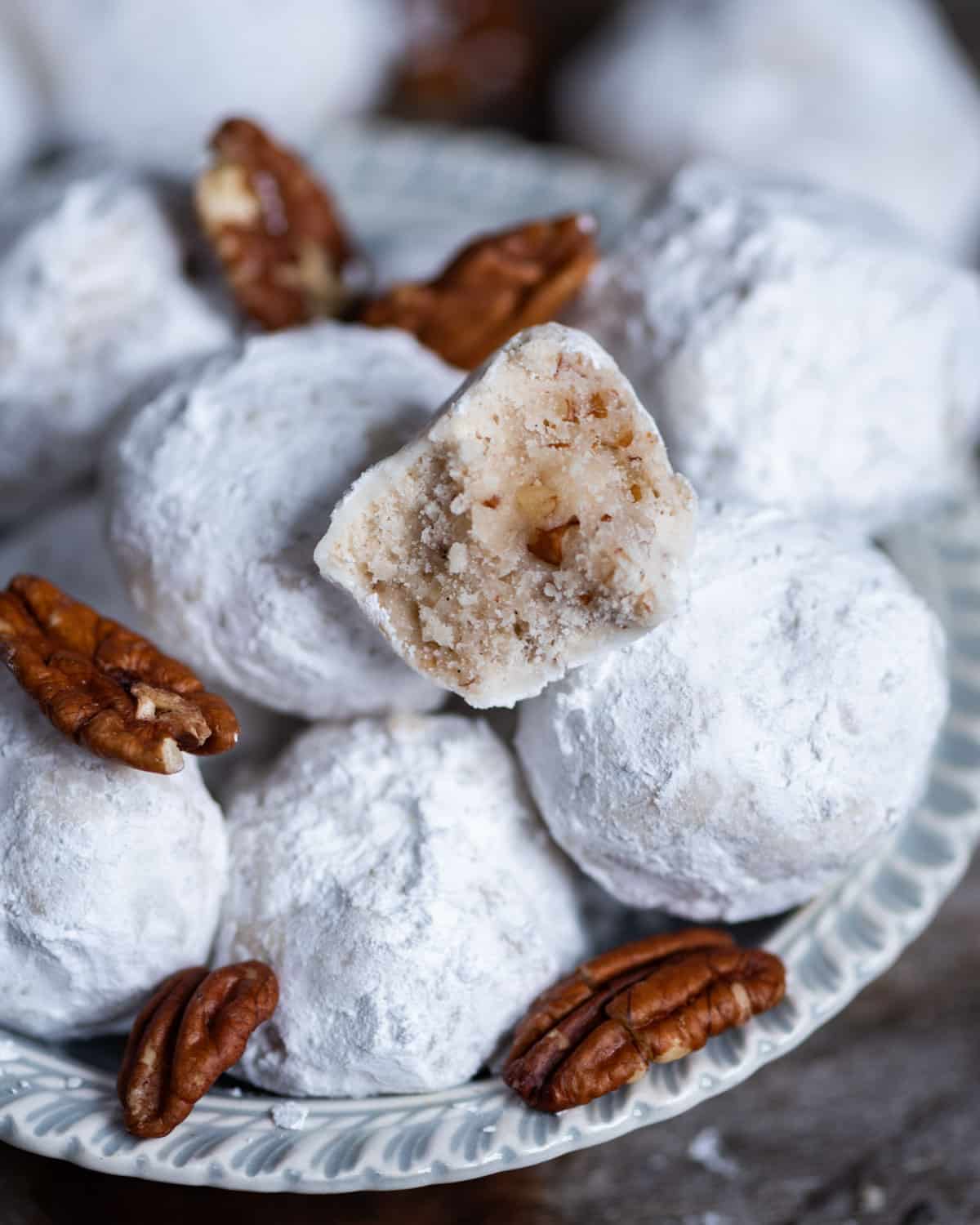 a bowl of mexican snowball cookies