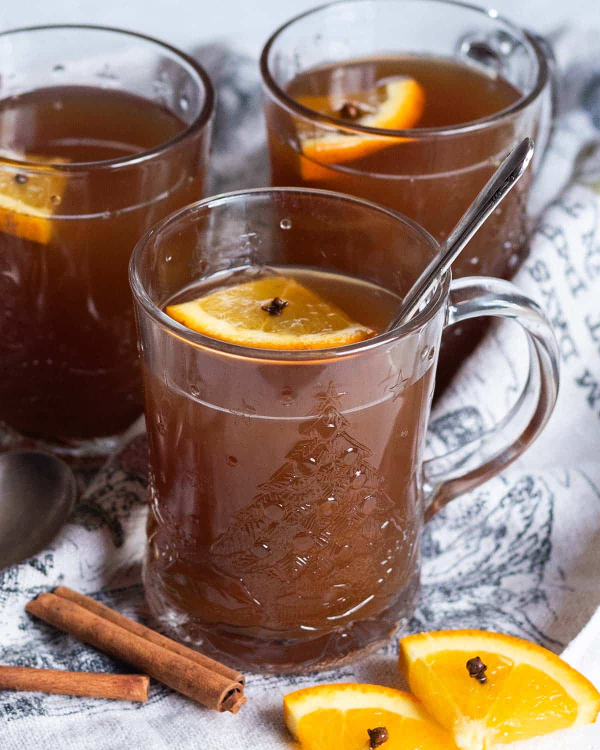 cups of russian tea with slices of orange