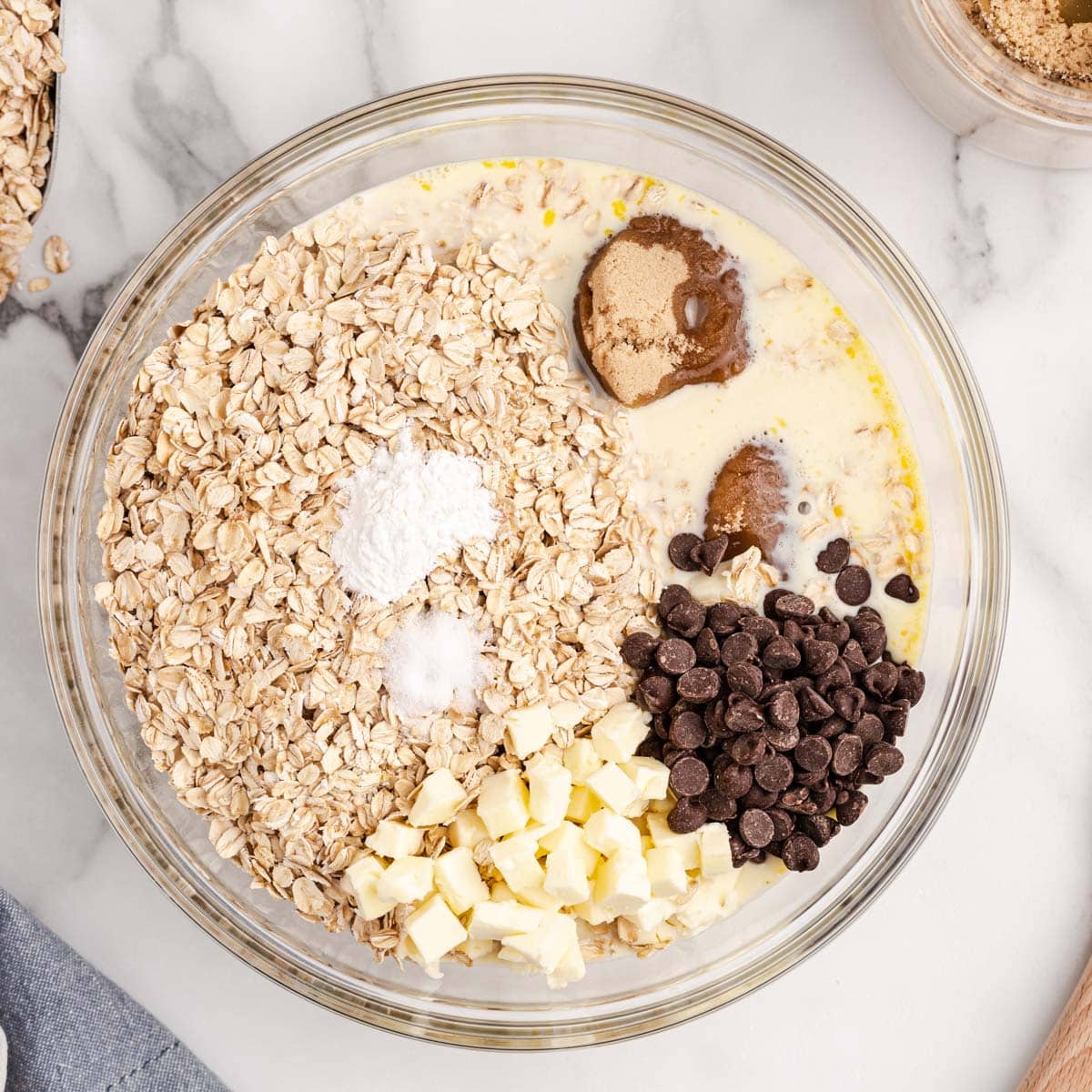 ingredients for baked oatmeal in a bowl, unmixed