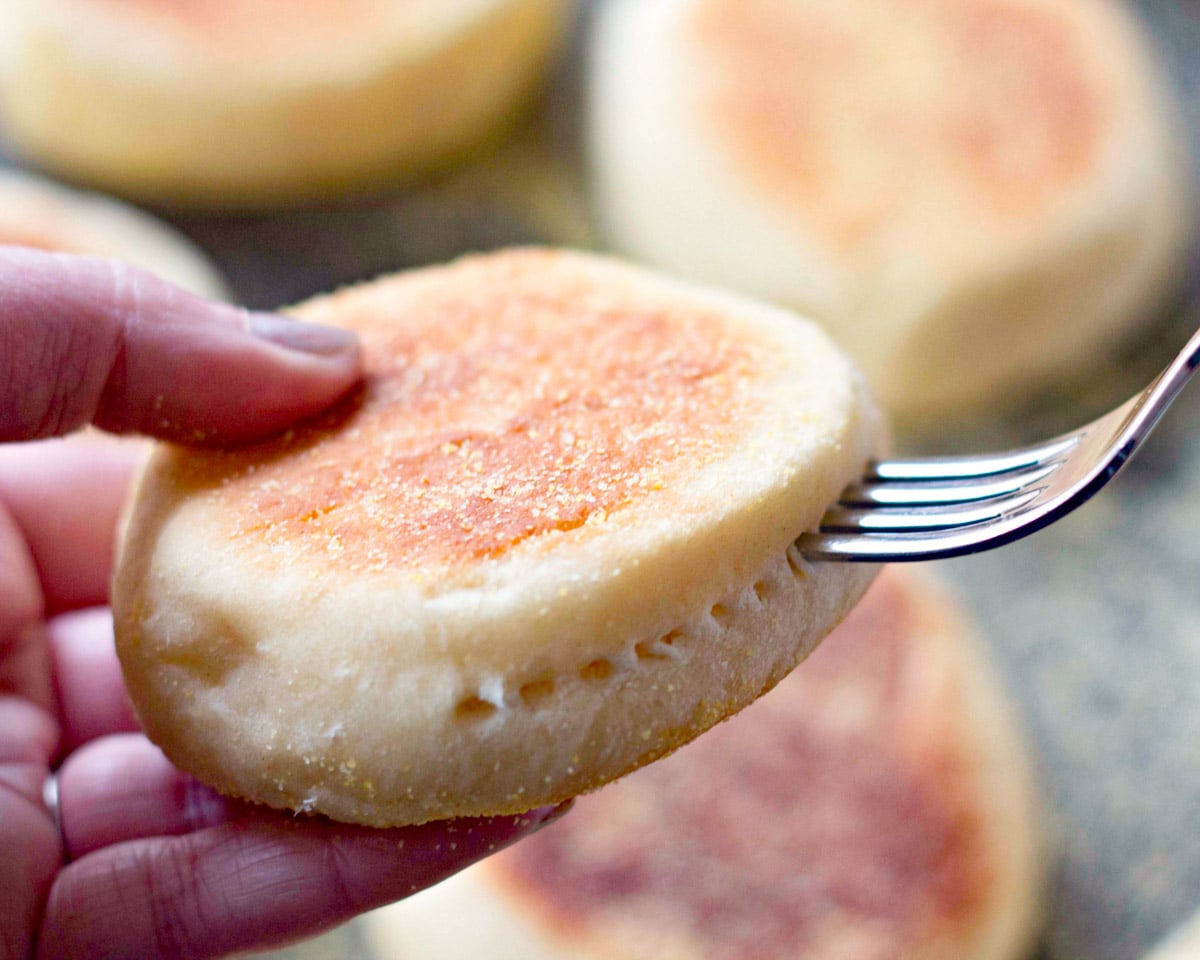 fork sticking into an english muffin