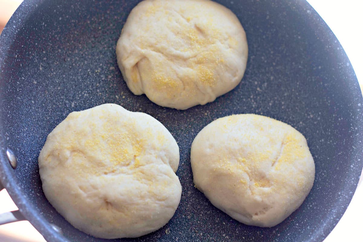 english muffin dough in a skillet