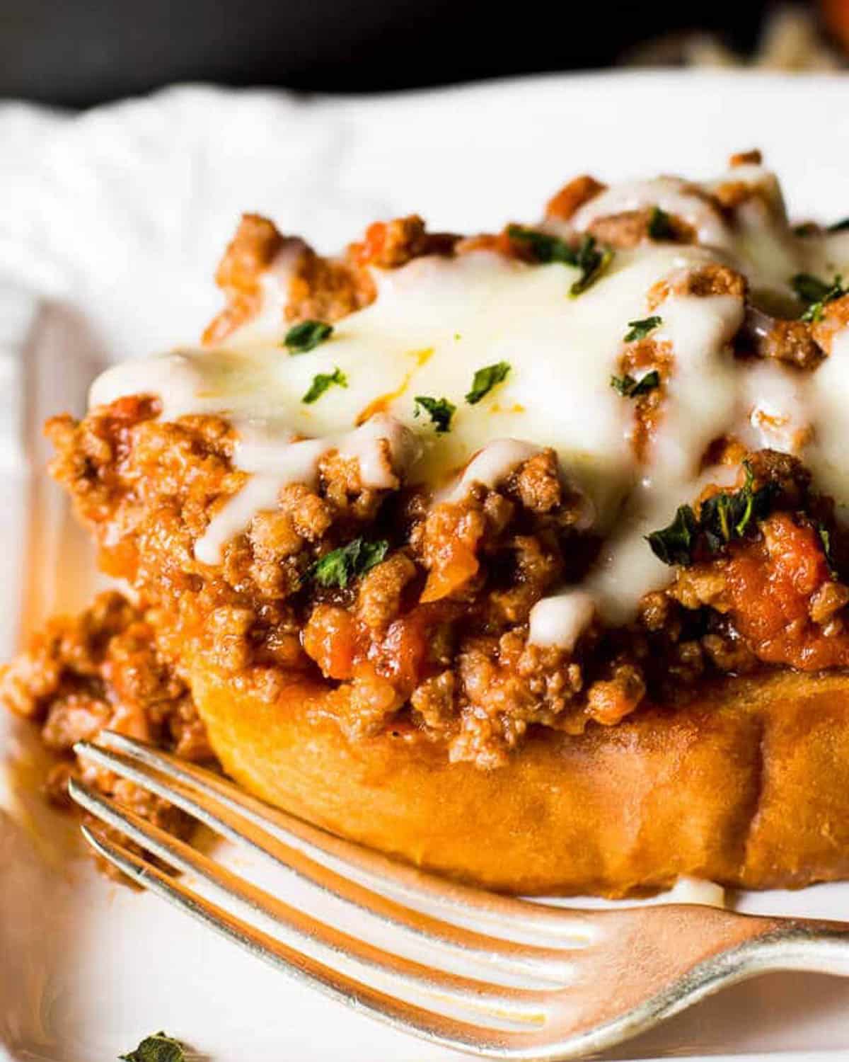 an open faced italian sloppy joe sandwich