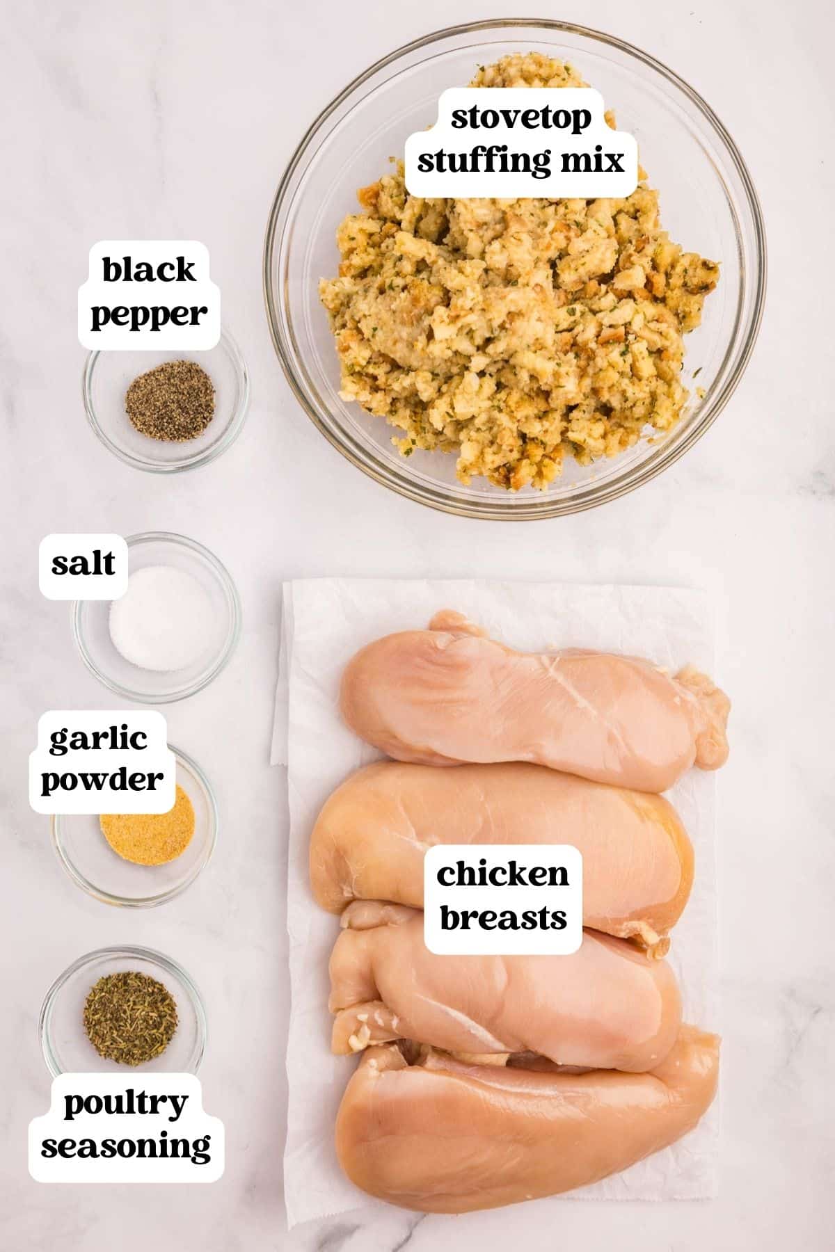 ingredients for stuffed chicken breasts on a table